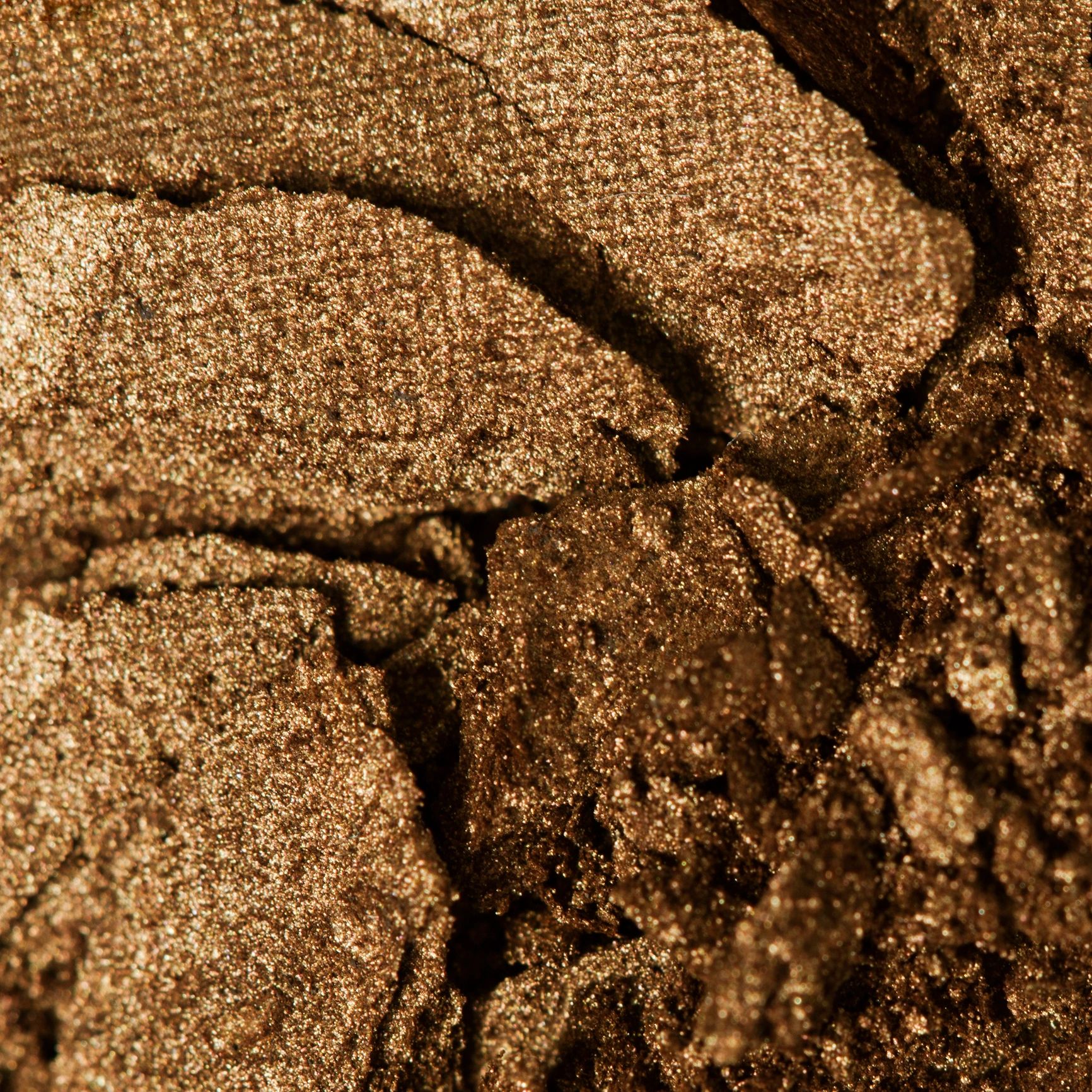 Textura de sombra de ojos en tono bronce
